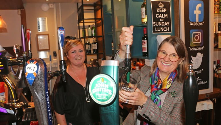 Cheers! MP toasts reopening of Duck Inn